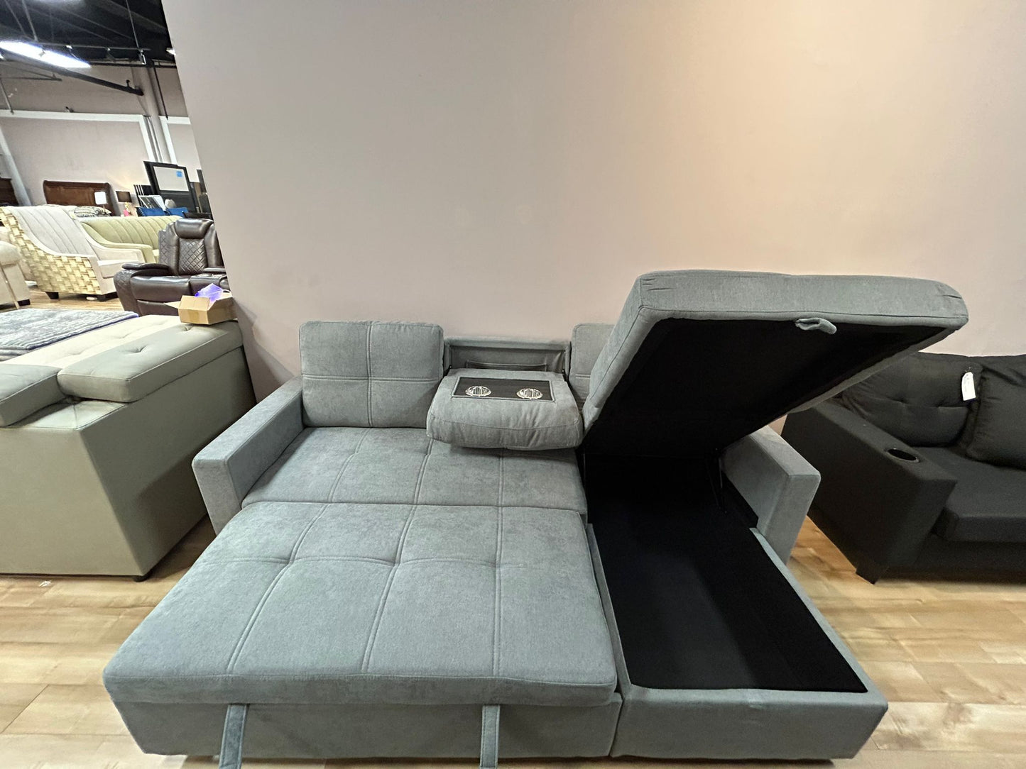 caesar-reversible-sectional-sofa-bed-with-storage-cup_holders