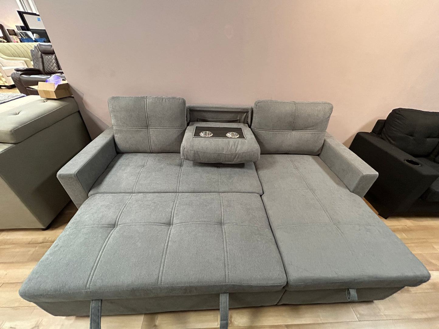 caesar-reversible-sectional-sofa-bed-with-storage_cup-holders